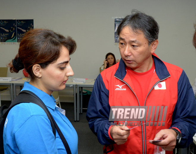 Делегации различных стран проходят аккредитацию на Кубок мира по прыжкам на батуте в Баку. Азербайджан, 3 март, 2016 